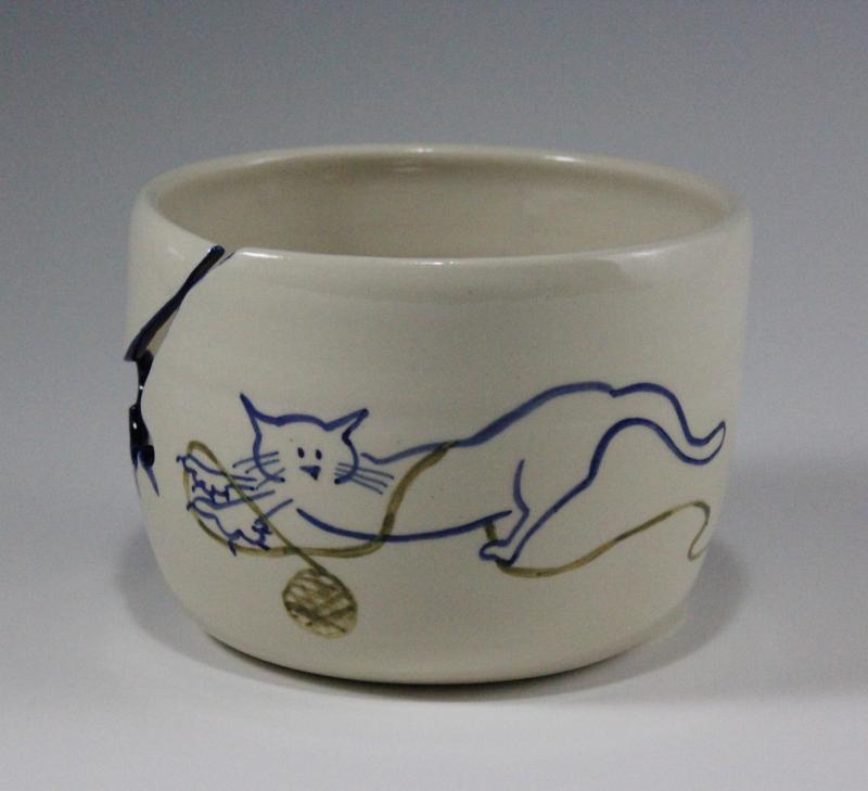 Whisker Design Yarn Bowl with Green Yarn